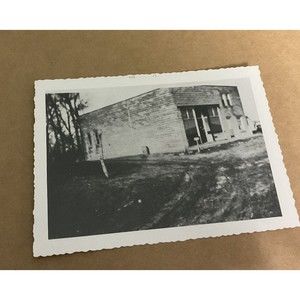 Found VTG Black/White Picture Old Brick Building Store Front Dirt Road 3.5” X 5”